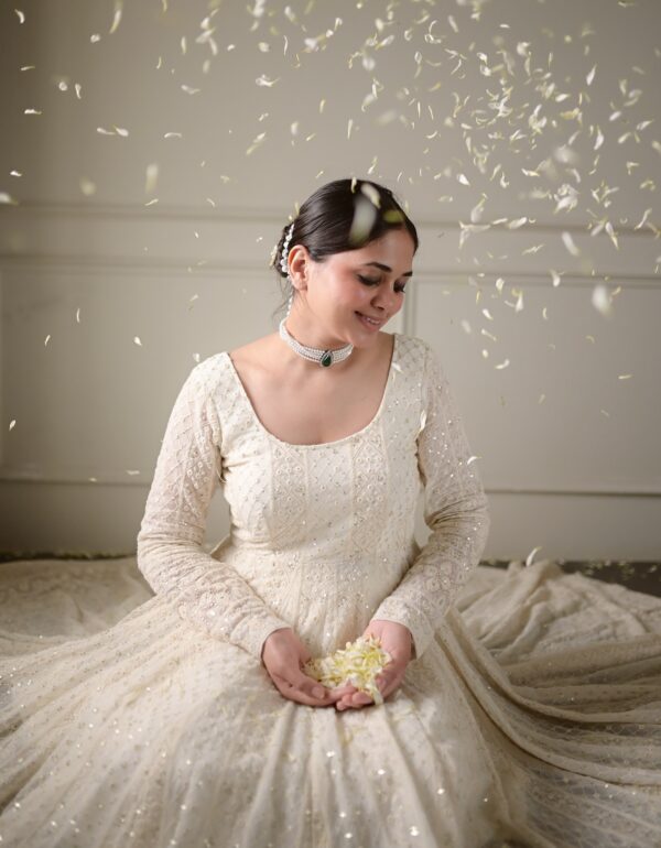 Regal Off-White Anarkali Set With Zari Sequin Elegance