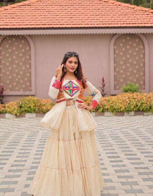Nidhi Tiered Ivory Lehenga with Traditional Mirror Work Jacket