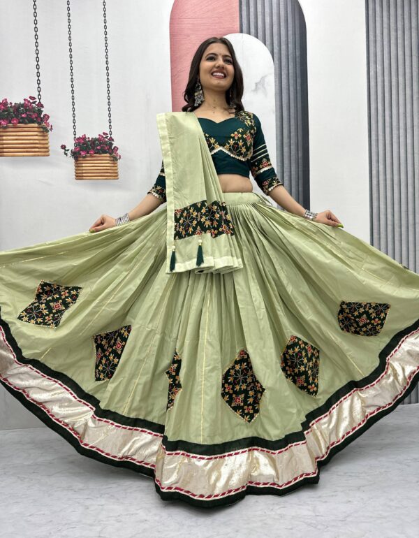 Niyati Nazakat Mirror  Motif Magic in Purple And Olive Lehenga Set