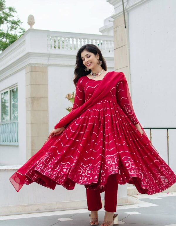 Grace in Every Twirl: Festive Red Magic Designer Anarkali Suit