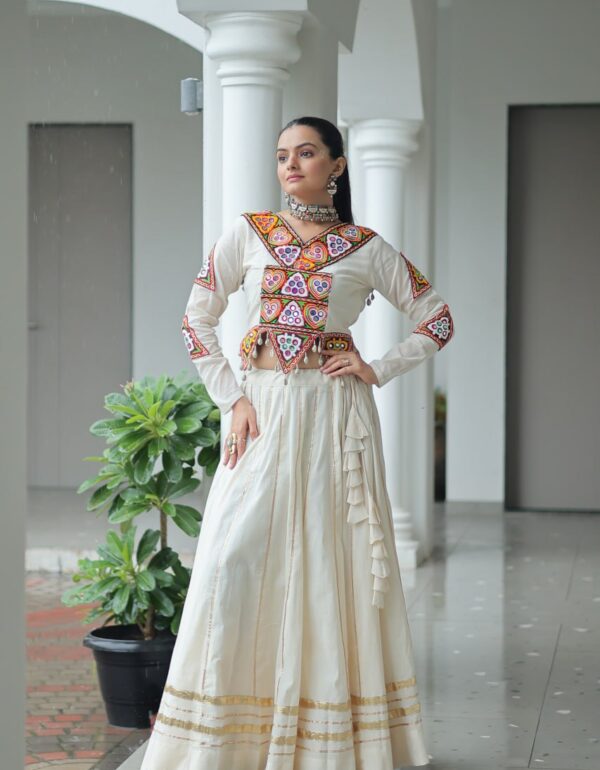 Taashi’s Festive Flare: Kutchi Mirror Jacket with Silk Draped Lehenga